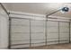 Bright interior of an open garage at 16813 S 30Th Ave, Phoenix, AZ 85045