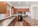 Well-equipped kitchen with stainless steel appliances and ample counter space at 16813 S 30Th Ave, Phoenix, AZ 85045