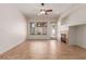 Bright living room with high ceilings, tile flooring, and a modern fireplace at 16813 S 30Th Ave, Phoenix, AZ 85045