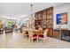 Elegant dining room with large wooden table, seating for six, and a stylish glass front cabinet at 17214 E Alta Loma --, Fountain Hills, AZ 85268