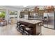 Well-lit kitchen featuring a center island with seating and modern appliances, ideal for cooking at 17214 E Alta Loma --, Fountain Hills, AZ 85268