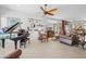 Stylish living room featuring a piano, comfortable seating, and unique decor at 17214 E Alta Loma --, Fountain Hills, AZ 85268