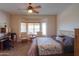 Bright bedroom featuring a bay window and desk, creating a versatile and functional space at 1880 E Birch St, Casa Grande, AZ 85122
