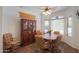 Dining area with tile floors, decorative lighting and large windows for natural light at 1880 E Birch St, Casa Grande, AZ 85122