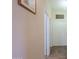 Inviting hallway featuring tile flooring and doors, offering a glimpse into the home's layout and design at 1880 E Birch St, Casa Grande, AZ 85122