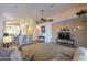 Expansive living room features carpet flooring, open layout, and access to kitchen at 1880 E Birch St, Casa Grande, AZ 85122
