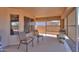 Covered patio with ample seating, ideal for enjoying outdoor moments in comfort and style at 1880 E Birch St, Casa Grande, AZ 85122