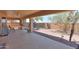 Comfortable covered patio perfect for outdoor dining and relaxation overlooking the garden at 1880 E Birch St, Casa Grande, AZ 85122