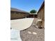 Backyard featuring a concrete patio area and gravel groundcover at 1898 N Hubbard Ln, Casa Grande, AZ 85122