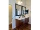 Bathroom vanity features dual sinks with modern fixtures and ample counter space at 1898 N Hubbard Ln, Casa Grande, AZ 85122