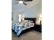 Serene bedroom with a comfortable bed, stylish nightstands, and soft lighting for restful sleep at 1898 N Hubbard Ln, Casa Grande, AZ 85122
