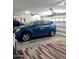 Well-kept garage featuring a clean interior and space for parking a car at 1898 N Hubbard Ln, Casa Grande, AZ 85122