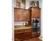 Elegant kitchen with granite countertops, stainless steel appliances and built-in oven and microwave at 1898 N Hubbard Ln, Casa Grande, AZ 85122