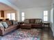 Spacious living room featuring comfortable sofas, stylish decor, and ample natural light for relaxation at 1898 N Hubbard Ln, Casa Grande, AZ 85122
