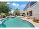 Stunning backyard pool with lush landscaping provides a tranquil outdoor oasis and beautiful views at 19339 E Mockingbird Dr, Queen Creek, AZ 85142