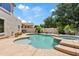 Private backyard pool and spa, surrounded by a well maintained patio and verdant landscaping at 19339 E Mockingbird Dr, Queen Creek, AZ 85142