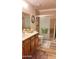 Neutral bathroom features a single sink vanity and a step-in shower at 2064 S Farnsworth Dr # 38, Mesa, AZ 85209