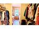 Well-organized bedroom closet, showcasing ample storage and natural light at 2064 S Farnsworth Dr # 38, Mesa, AZ 85209