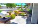 Inviting front porch area with comfortable seating and decorative plants at 2064 S Farnsworth Dr # 38, Mesa, AZ 85209