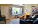 Bright living room featuring a large window, comfortable seating, and stylish decor at 2064 S Farnsworth Dr # 38, Mesa, AZ 85209
