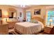 Serene bedroom featuring a comfortable bed and natural lighting at 2064 S Farnsworth Dr # 38, Mesa, AZ 85209