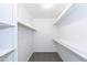 Walk-in closet with built-in shelving for ample storage and organization at 222 W Brown Rd # 72, Mesa, AZ 85201