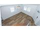Bright entryway featuring wood-look floors, white walls, and a modern ceiling fan at 222 W Brown Rd # 72, Mesa, AZ 85201