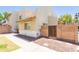 Charming townhome with stucco walls, a tiled roof, and private gated entry at 222 W Brown Rd # 72, Mesa, AZ 85201