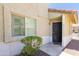 Attractive exterior showcasing the front entrance, a covered porch, and desert-friendly landscaping at 222 W Brown Rd # 72, Mesa, AZ 85201