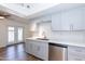 Bright kitchen features shaker cabinets, stainless appliances, stone countertops and backyard access at 222 W Brown Rd # 72, Mesa, AZ 85201