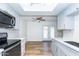 Bright kitchen featuring stainless steel appliances, white countertops, and modern cabinetry at 222 W Brown Rd # 72, Mesa, AZ 85201