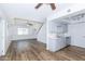 Modern open floorplan with recessed ceiling, wood floors, and bright living area at 222 W Brown Rd # 72, Mesa, AZ 85201