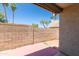 Private patio with brick wall providing a secluded outdoor space at 222 W Brown Rd # 72, Mesa, AZ 85201