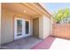Covered patio featuring double glass doors and additional storage at 222 W Brown Rd # 72, Mesa, AZ 85201
