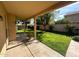Lush backyard view from the covered patio, showcasing the greenery and providing a serene outdoor space at 2301 E Beachcomber Dr, Gilbert, AZ 85234