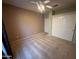 Bedroom with ceiling fan and double door closet at 2301 E Beachcomber Dr, Gilbert, AZ 85234