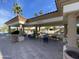 The cabana area with tables and chairs provides a shaded and social gathering space within the community at 2301 E Beachcomber Dr, Gilbert, AZ 85234