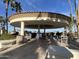 The Palm Patio area offers covered seating and scenic lake views, perfect for outdoor dining and relaxation at 2301 E Beachcomber Dr, Gilbert, AZ 85234