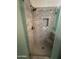 Elegant tiled shower features a rainfall shower head and built-in bench at 2301 E Beachcomber Dr, Gilbert, AZ 85234