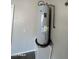 The garage features a modern water heater, efficiently providing hot water throughout the home at 2301 E Beachcomber Dr, Gilbert, AZ 85234