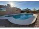 Backyard with pool, hot tub, and desert landscaping at 2331 W Via Rialto Cir, Mesa, AZ 85202