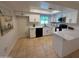 Stylish kitchen featuring stainless steel appliances and quartz countertops at 2331 W Via Rialto Cir, Mesa, AZ 85202