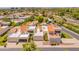 Aerial view of the condo's terracotta roofs, desert landscaping, and attached garages at 2413 E Rancho Dr, Phoenix, AZ 85016