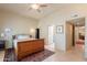 Spacious bedroom with a ceiling fan and large windows providing natural light at 2413 E Rancho Dr, Phoenix, AZ 85016