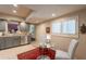 Eat in kitchen showcasing stainless steel appliances, recessed lighting, tile floors, and glass table at 2413 E Rancho Dr, Phoenix, AZ 85016