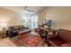 Cozy living room with ample seating, stylish area rug, and modern design elements at 2413 E Rancho Dr, Phoenix, AZ 85016
