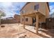 Backyard features a covered patio perfect for outdoor dining at 2509 E Meadow Land Dr, San Tan Valley, AZ 85140