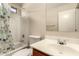 Cozy bathroom featuring a tub with quirky cactus-themed shower curtain, sink, and toilet at 2509 E Meadow Land Dr, San Tan Valley, AZ 85140