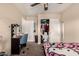This bedroom features vanity, closet, decorated bed, and good natural light at 2509 E Meadow Land Dr, San Tan Valley, AZ 85140