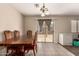 Cozy dining area offering tile floors, glass patio door access, and natural lighting at 2509 E Meadow Land Dr, San Tan Valley, AZ 85140